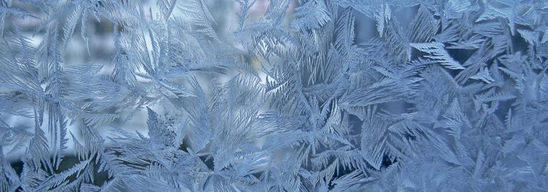 Hose bib winterization with frost covers in Rochester NY preventing frozen pipes